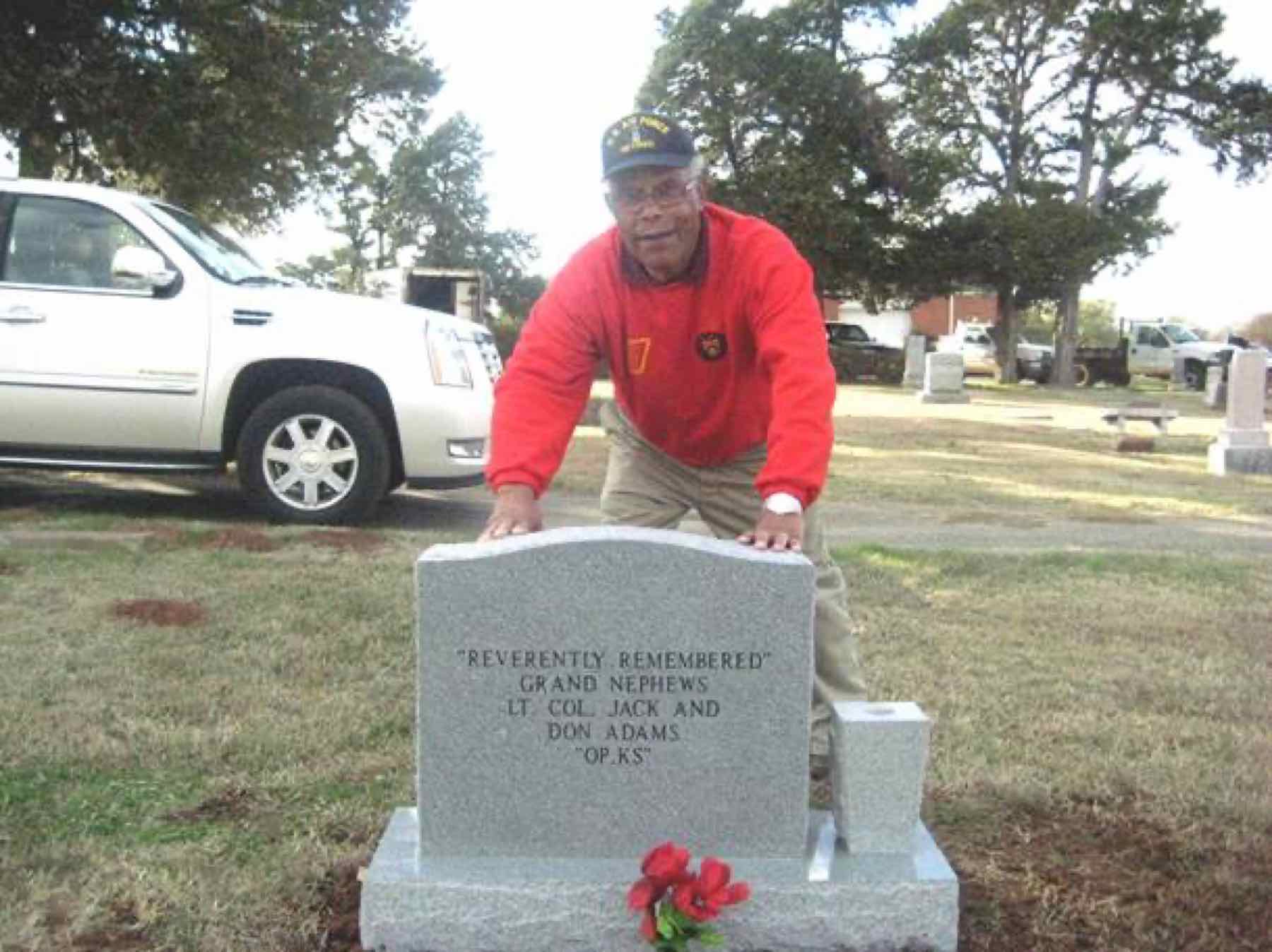Jack Adams at the reverse face of the headstone bearing the grand-nephews' dedication